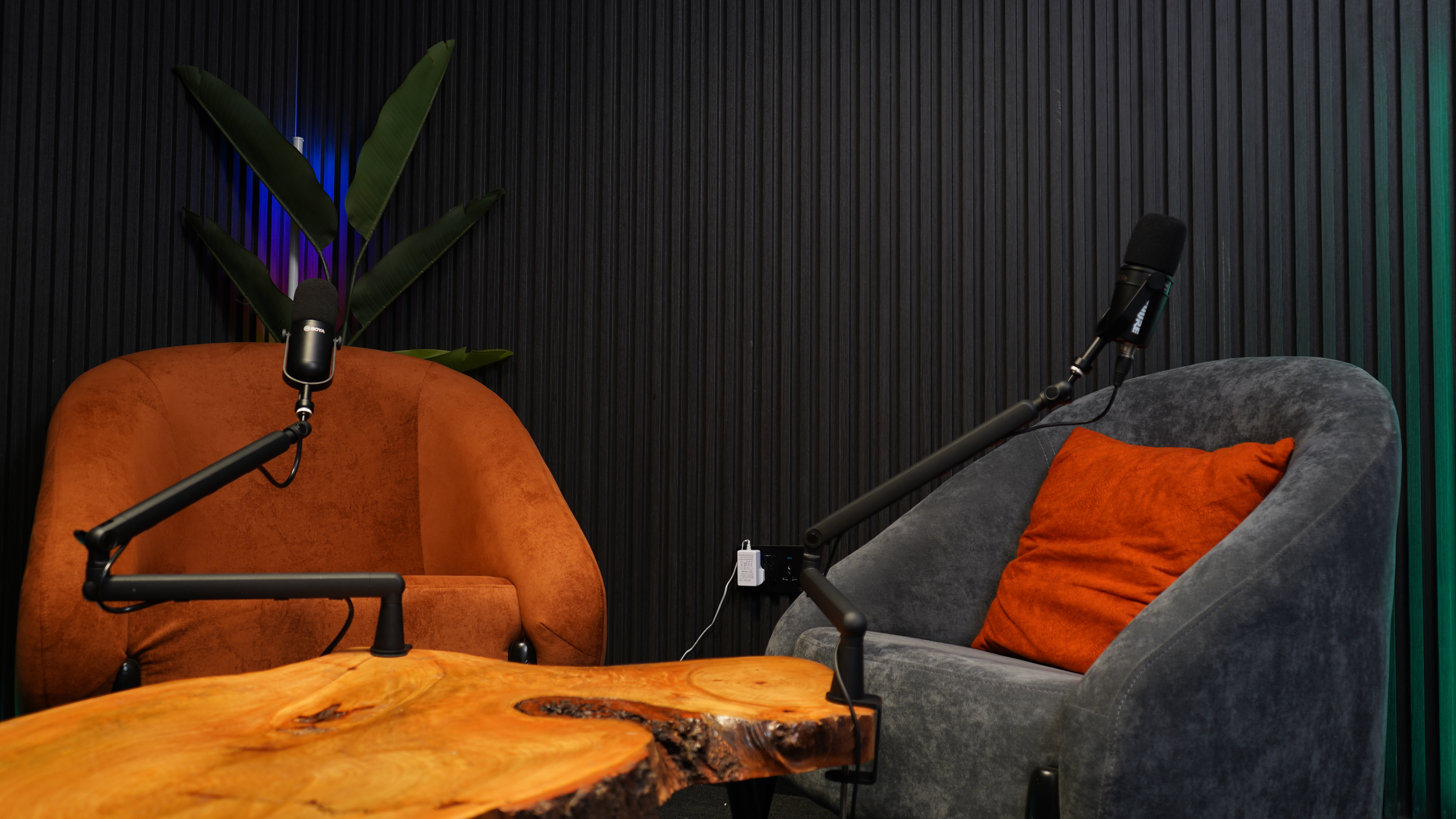Podcast recording detail with microphone and light